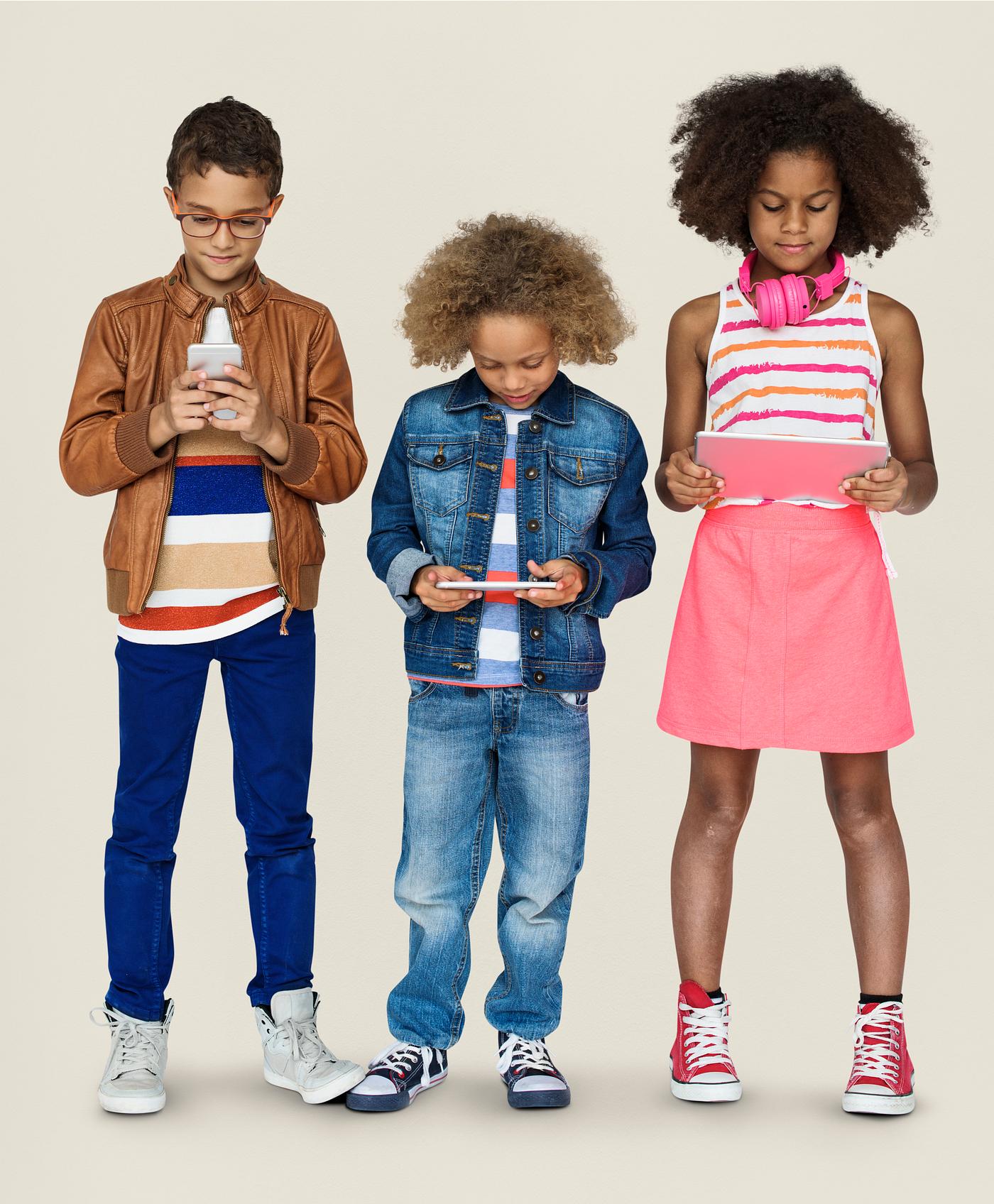 Kids using their digital devices Kids using their digital devices
