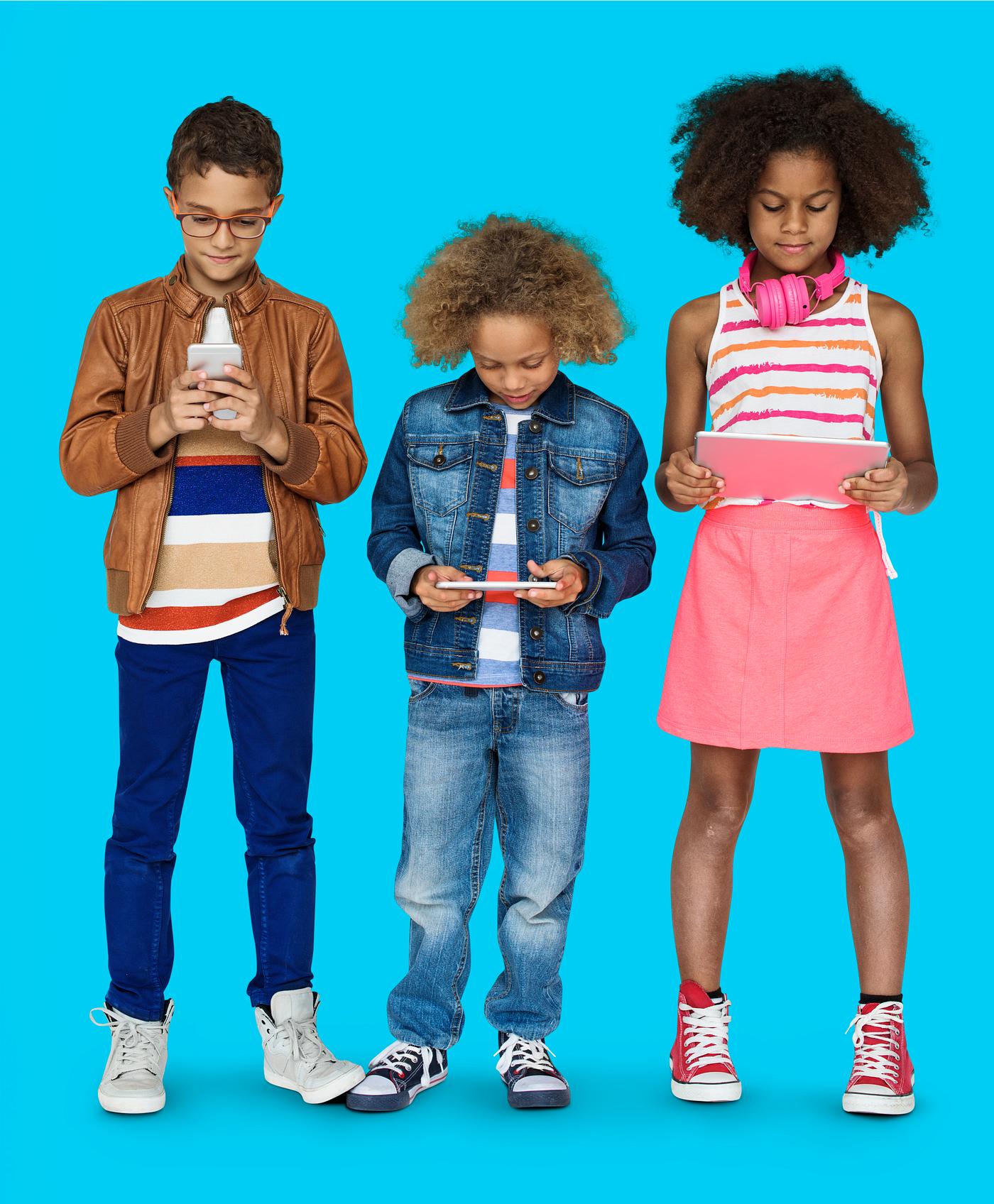 Kids using their digital devices Kids using their digital devices