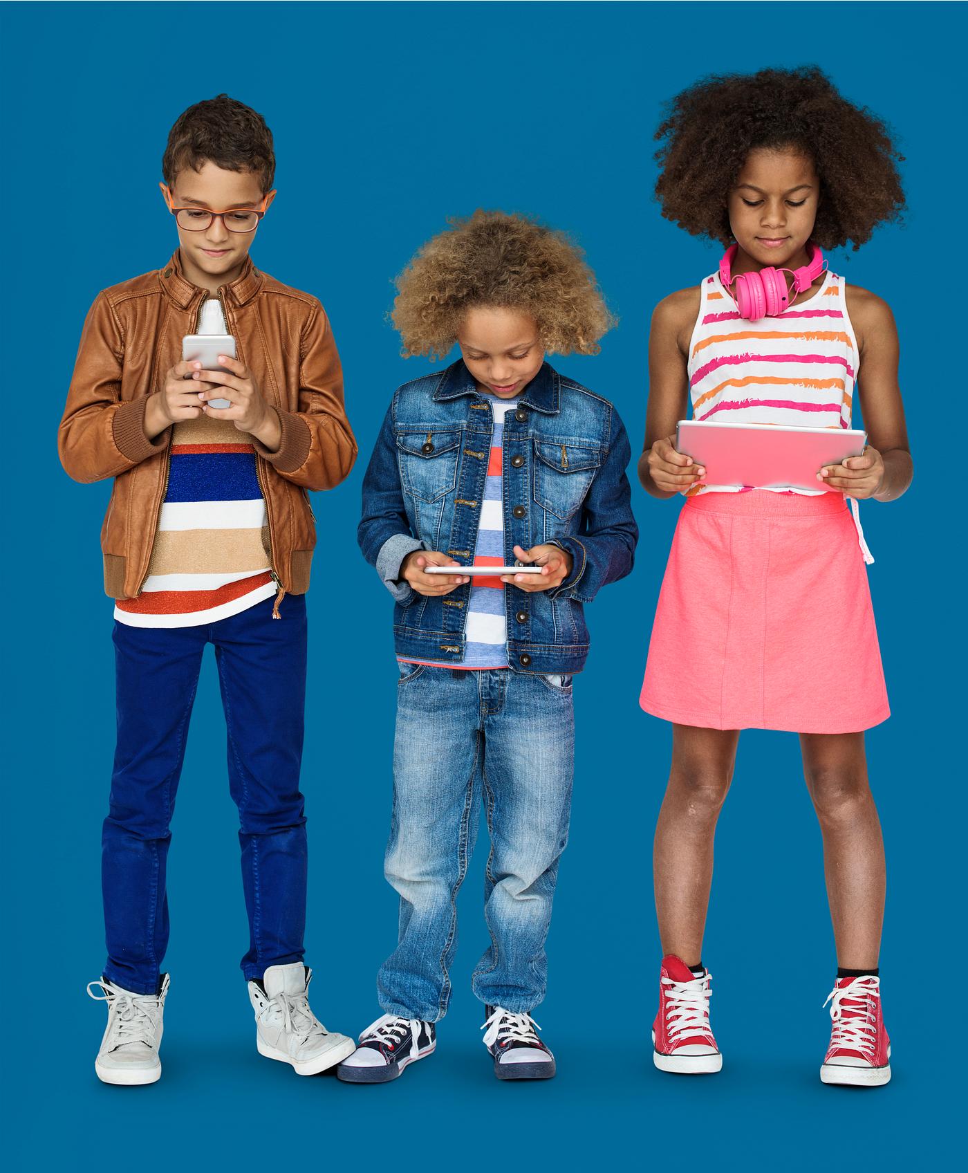 Kids using their digital devices Kids using their digital devices
