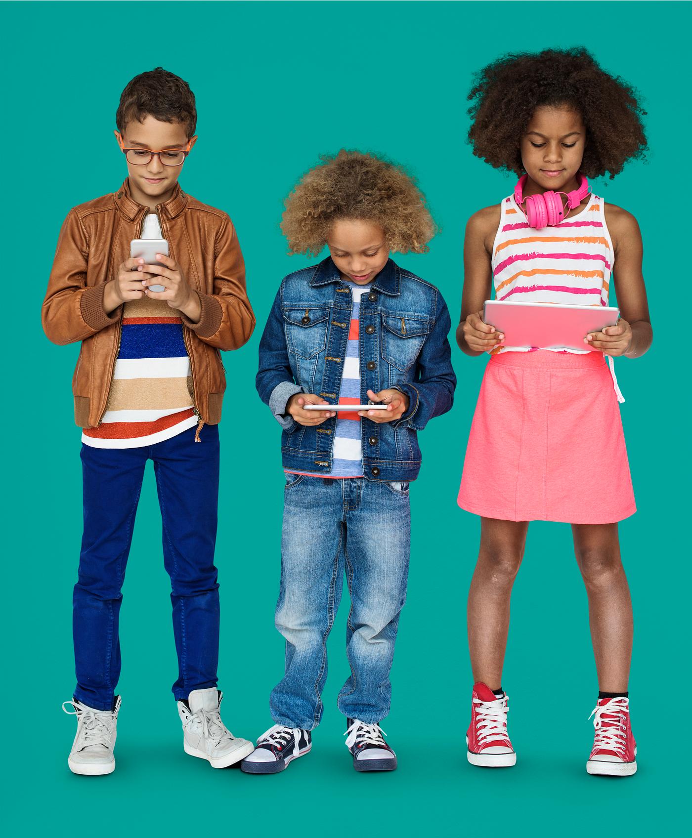 Kids using their digital devices Kids using their digital devices