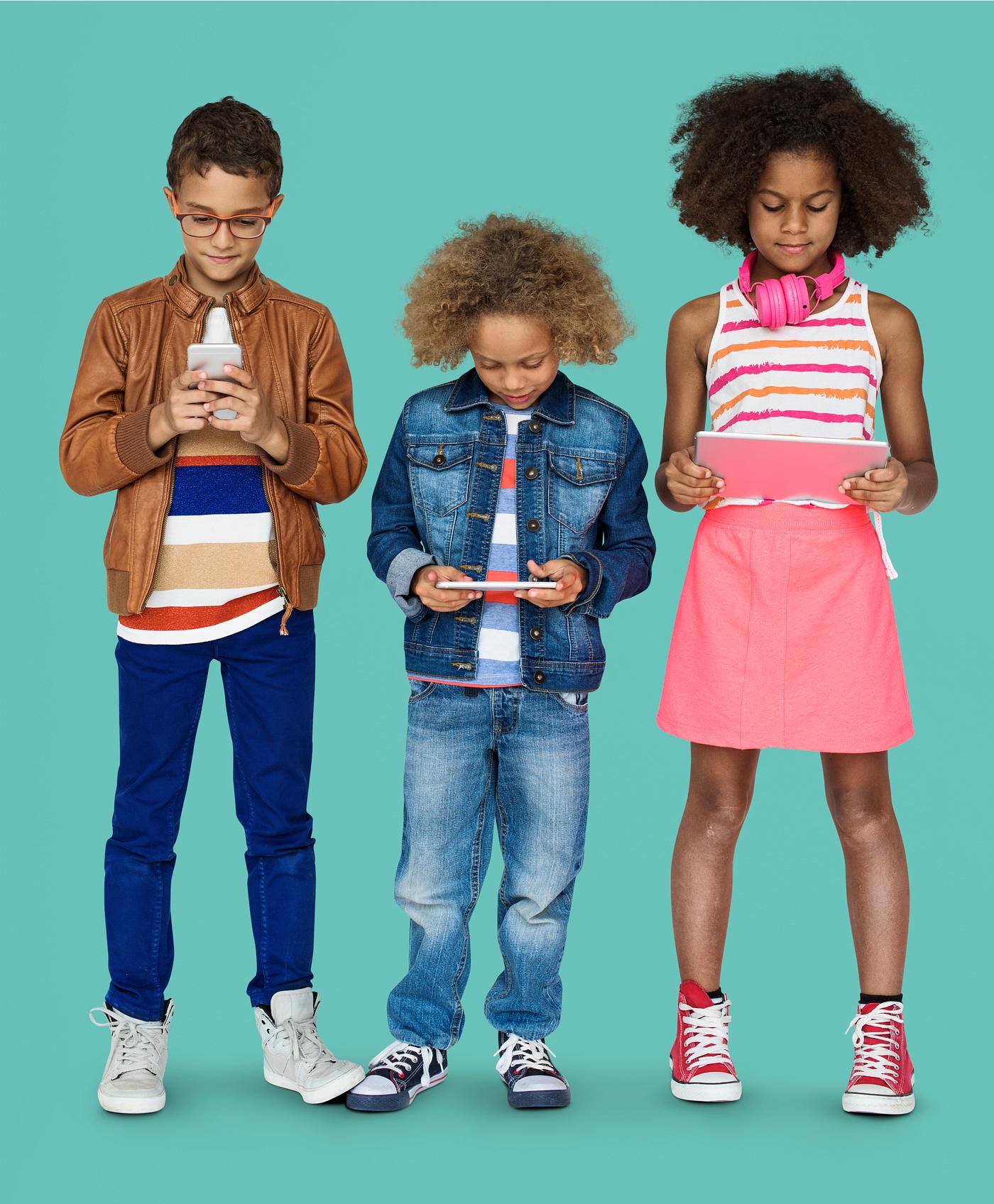 Kids using their digital devices Kids using their digital devices