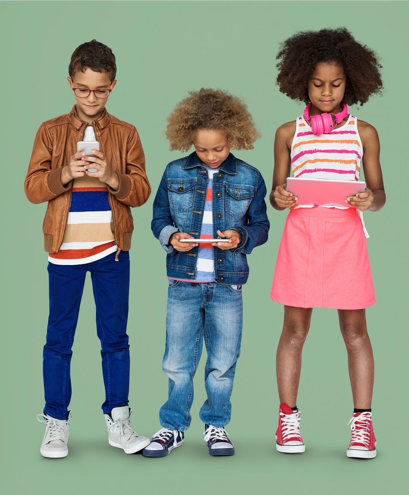 Kids using their digital devices Kids using their digital devices