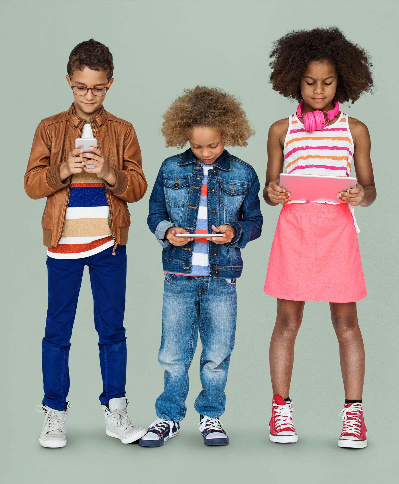Kids using their digital devices Kids using their digital devices