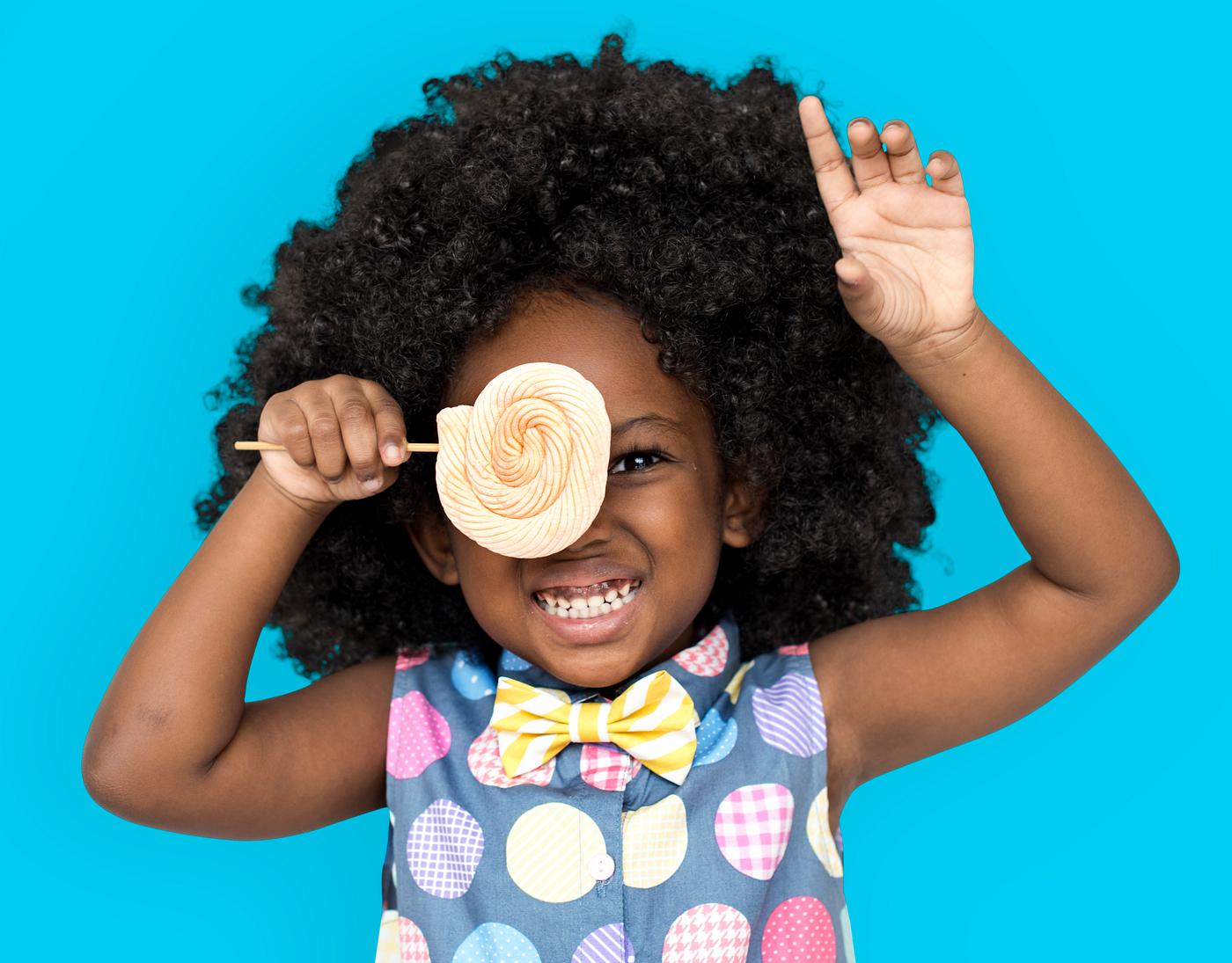 african descent, background, blue, candy, cheerful, child, emotion, expression, feeling, girl, happy, isolated, kid, little... african descent, background, blue, candy, cheerful, child, emotion, expression, feeling, girl, happy, isolated, kid, little...
