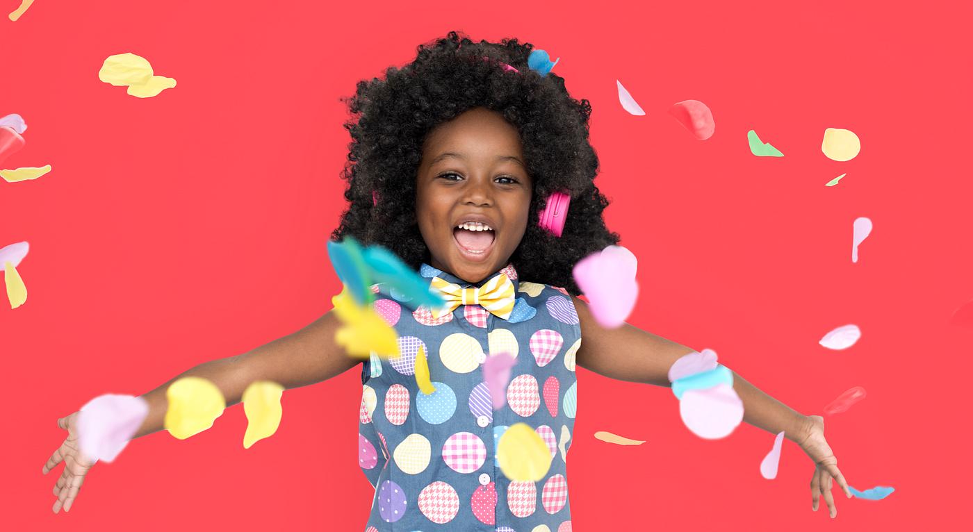Girl with an afro enjoying colorful confetti - expression, studio, person, little, people, positivity, kid, child, girl,... Girl with an afro enjoying colorful confetti - expression, studio, person, little, people, positivity, kid, child, girl,...