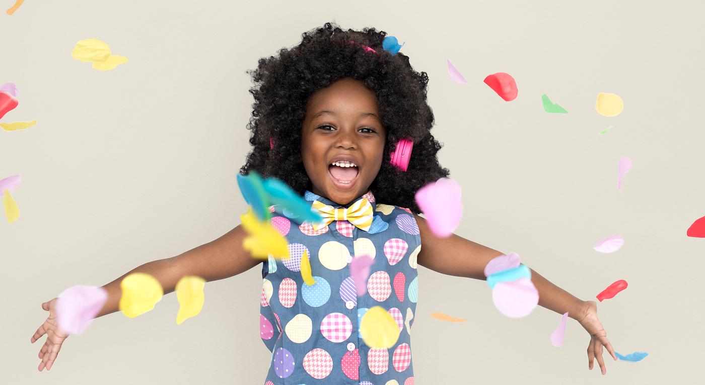 Little girl with afro hair having a party Little girl with afro hair having a party