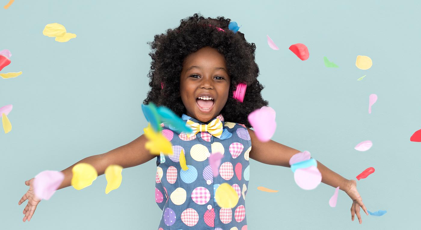 Girl with an afro enjoying colorful confetti - expression, studio, person, little, people, positivity, kid, child, girl,... Girl with an afro enjoying colorful confetti - expression, studio, person, little, people, positivity, kid, child, girl,...