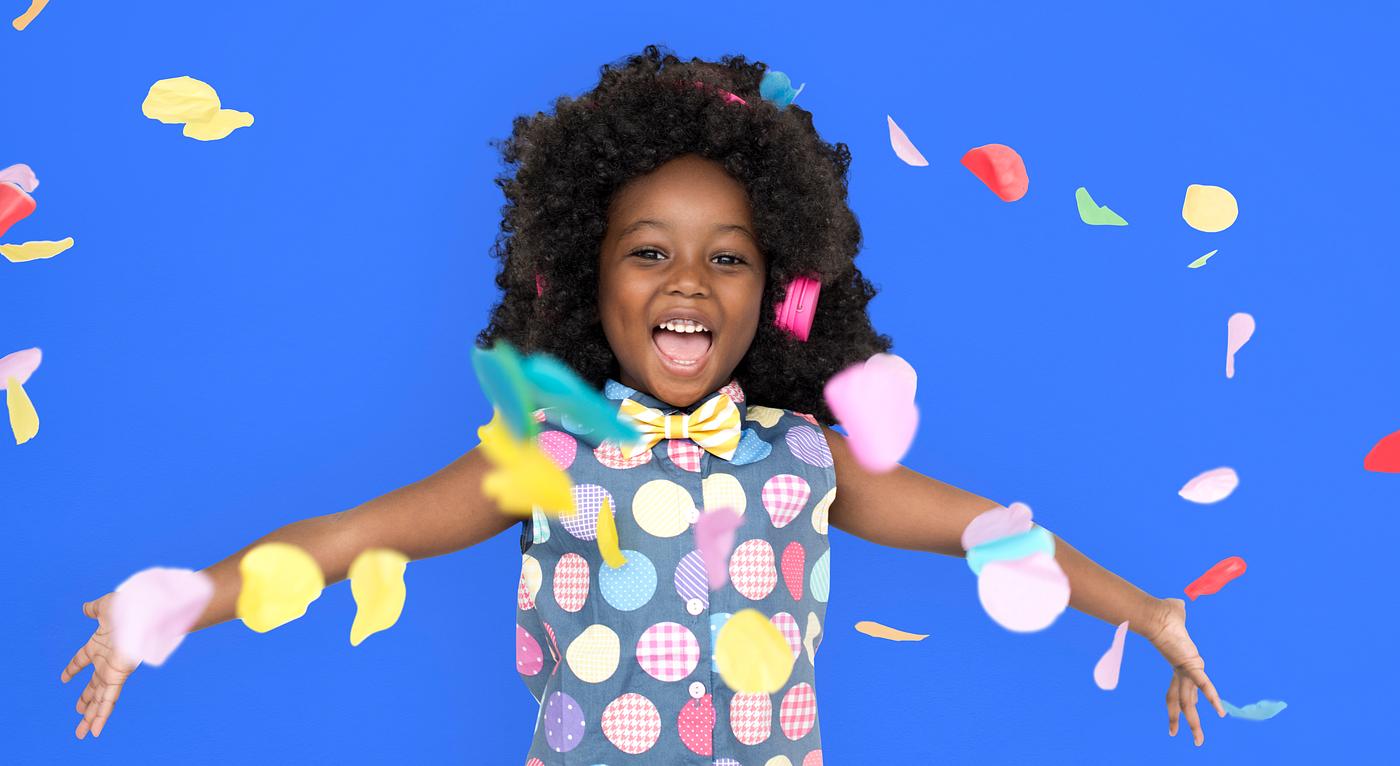 Girl with an afro enjoying colorful confetti - expression, studio, person, little, people, positivity, kid, child, girl,... Girl with an afro enjoying colorful confetti - expression, studio, person, little, people, positivity, kid, child, girl,...