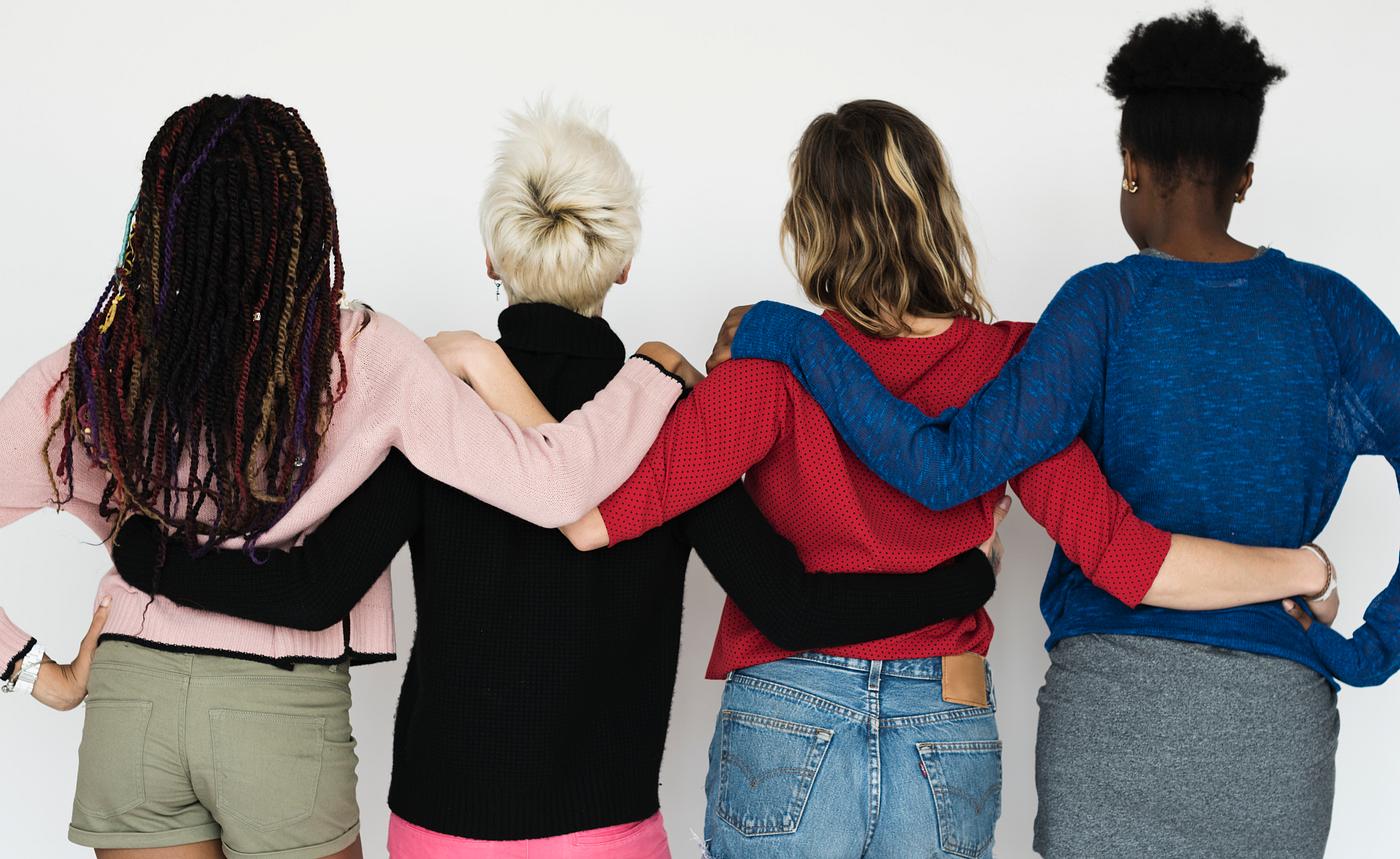 Diverse friends holding around each other - expression, studio, model, person, african, isolated on white, people, race,... Diverse friends holding around each other - expression, studio, model, person, african, isolated on white, people, race,...