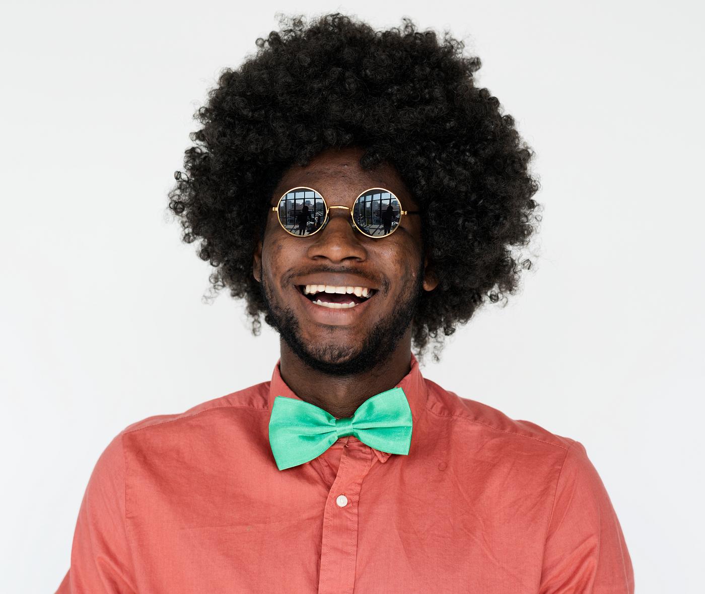 Portrait of a man with an Afro wig and glasses Portrait of a man with an Afro wig and glasses
