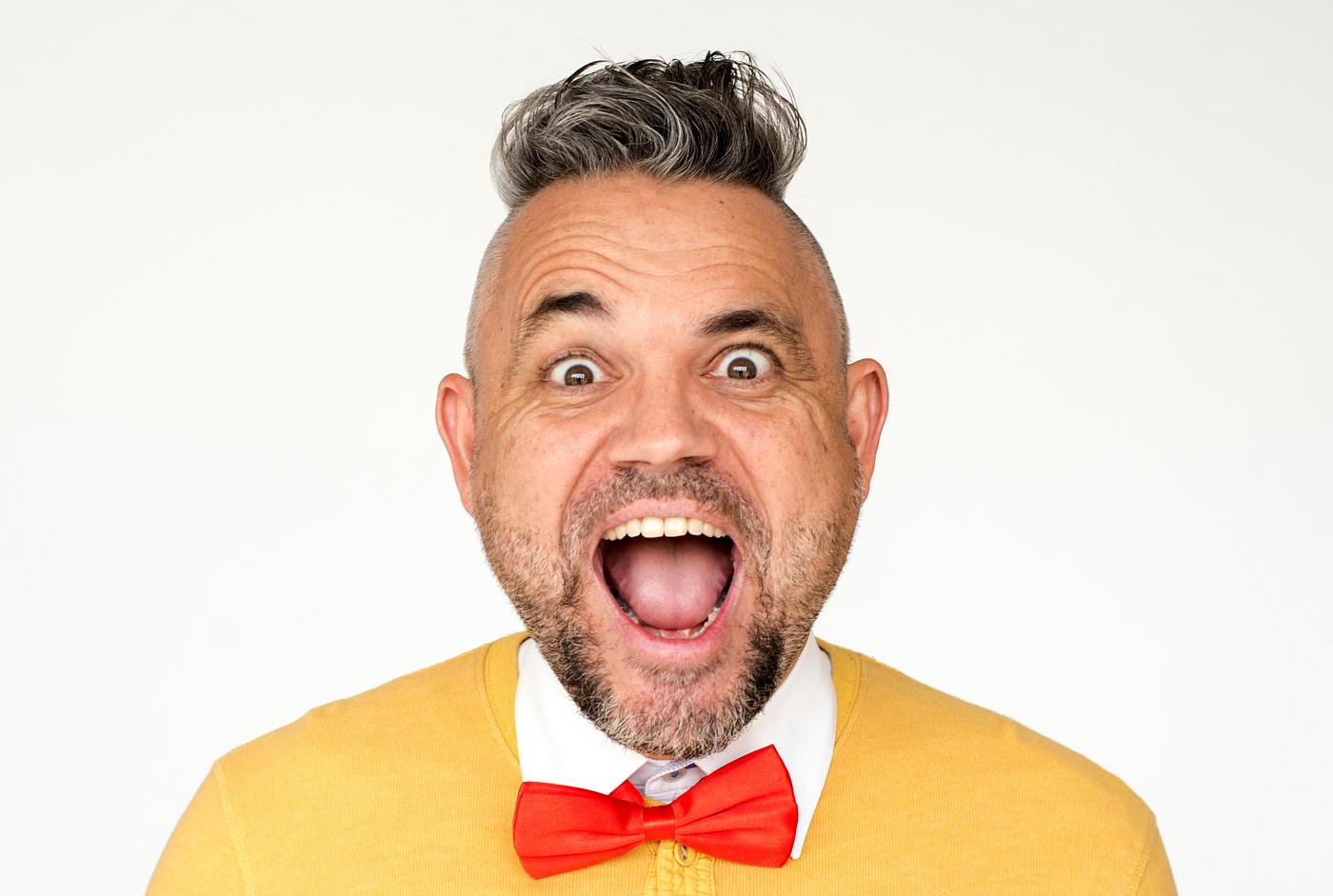 Portrait of a funny man in a yellow cardigan - funky, background, bow tie, cardigan, casual, cheerful, crazy, descent,... Portrait of a funny man in a yellow cardigan - funky, background, bow tie, cardigan, casual, cheerful, crazy, descent,...