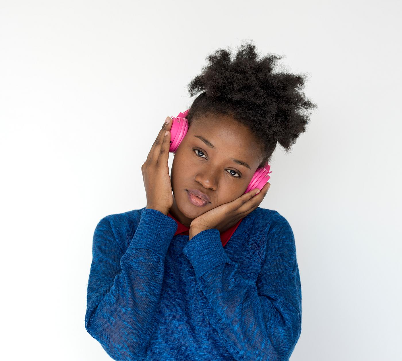 Portrait of a beautiful African girl with headphones Portrait of a beautiful African girl with headphones