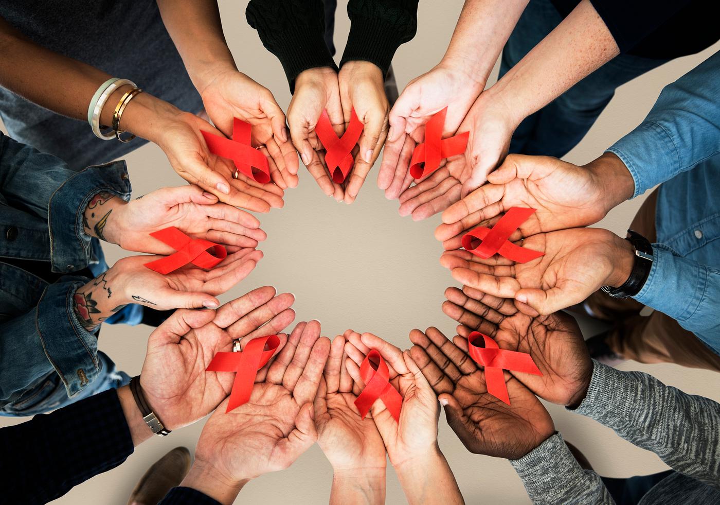 person, holding, red ribbon, awareness, charity, people, teamwork, hiv, friends, prevention, friendship, partnership,... person, holding, red ribbon, awareness, charity, people, teamwork, hiv, friends, prevention, friendship, partnership,...