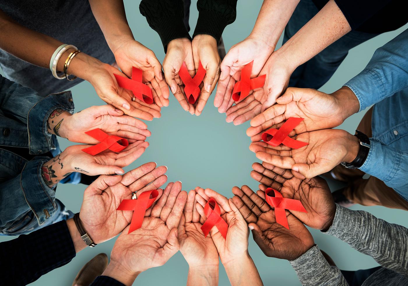 person, holding, red ribbon, awareness, charity, people, teamwork, hiv, friends, prevention, friendship, partnership,... person, holding, red ribbon, awareness, charity, people, teamwork, hiv, friends, prevention, friendship, partnership,...