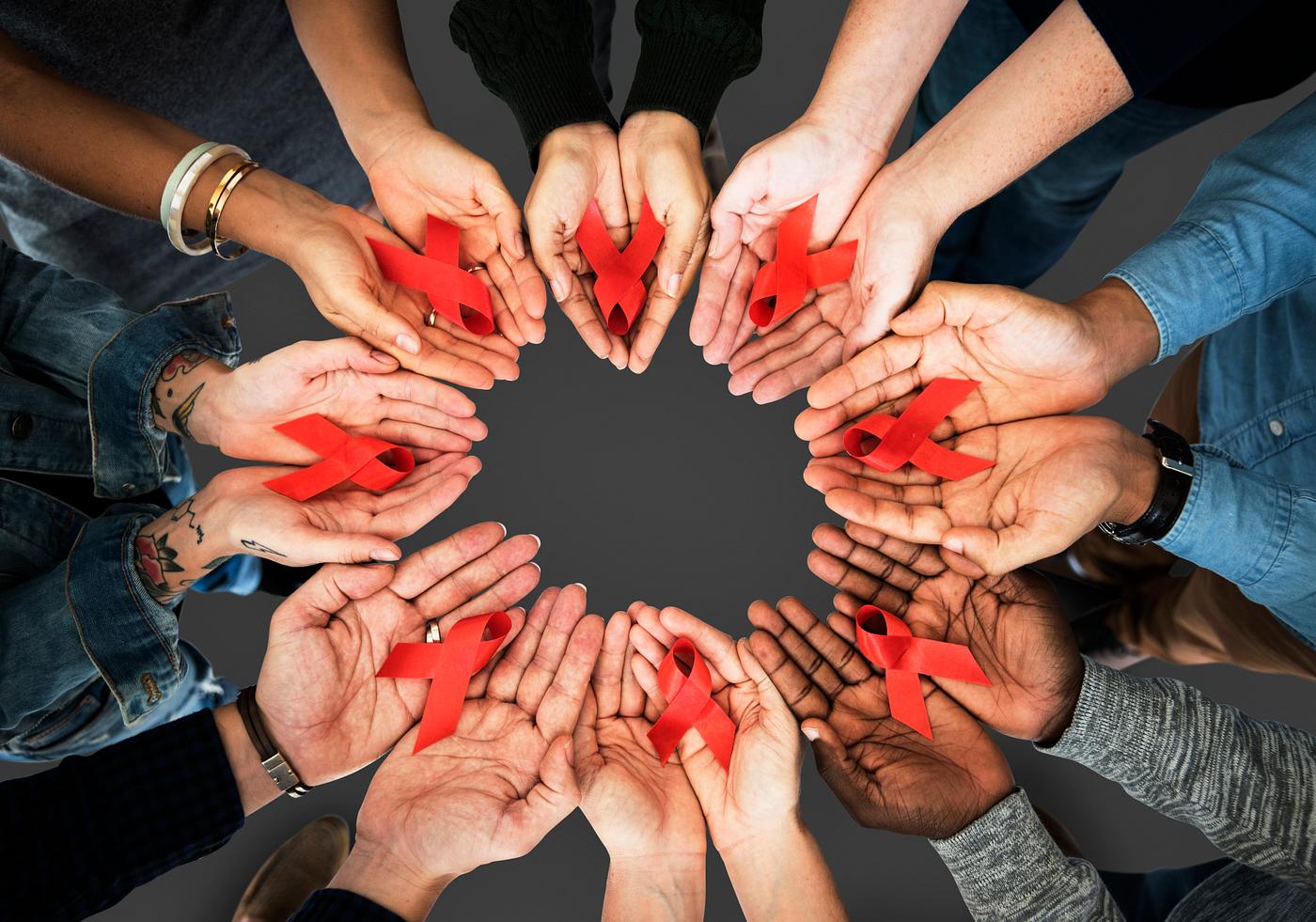 person, holding, red ribbon, awareness, charity, people, teamwork, hiv, friends, prevention, friendship, partnership,... person, holding, red ribbon, awareness, charity, people, teamwork, hiv, friends, prevention, friendship, partnership,...