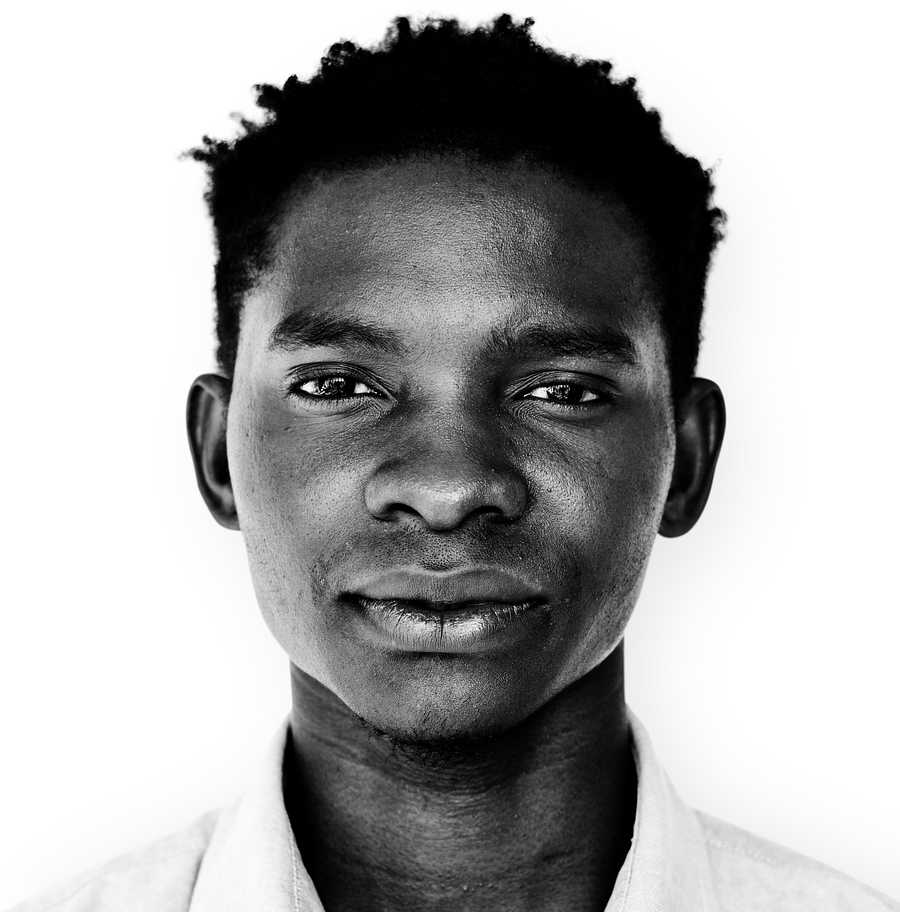 Portrait of an Ugandan man Portrait of an Ugandan man - african, african descent, alone, black, black and white, expression, face, feeling, grayscale…