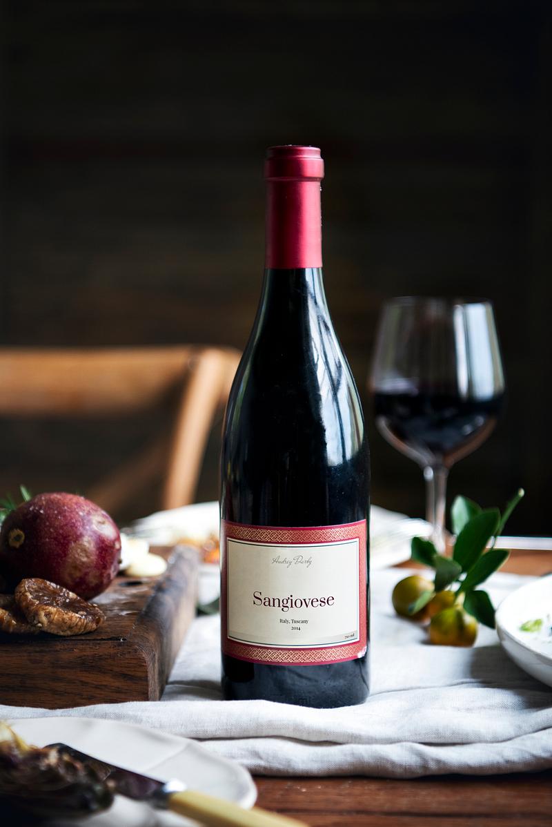 Woman Tasting Red Wine in a Classy Restaurant Royalty free stock Woman Tasting Red Wine in a Classy Restaurant Royalty free stock