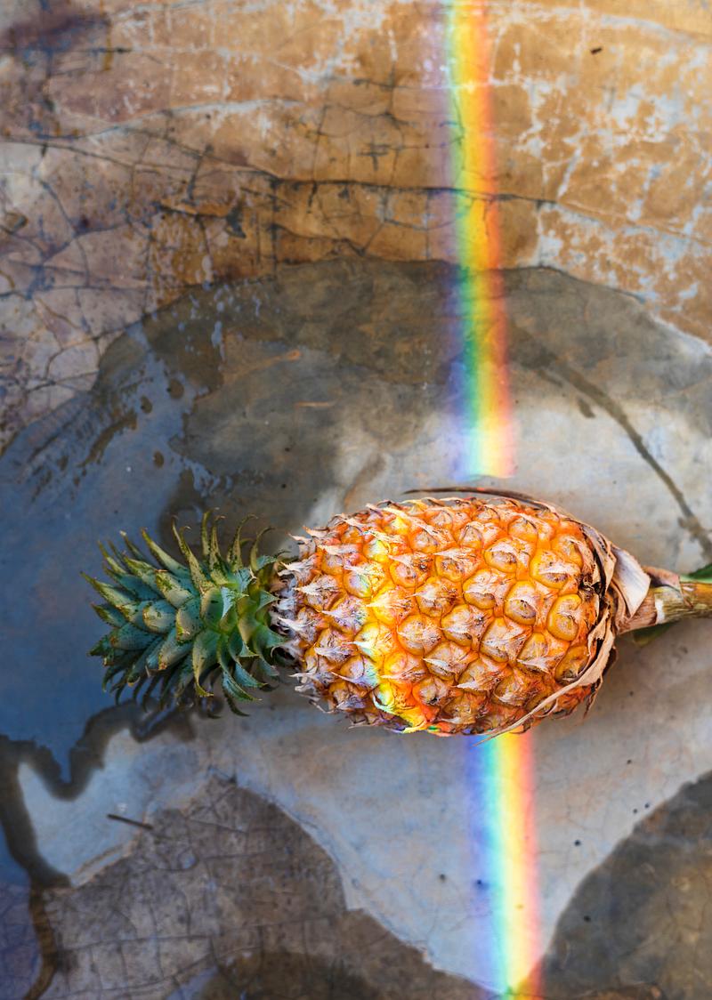 Pineapple with rainbow reflection light Pineapple with rainbow reflection light