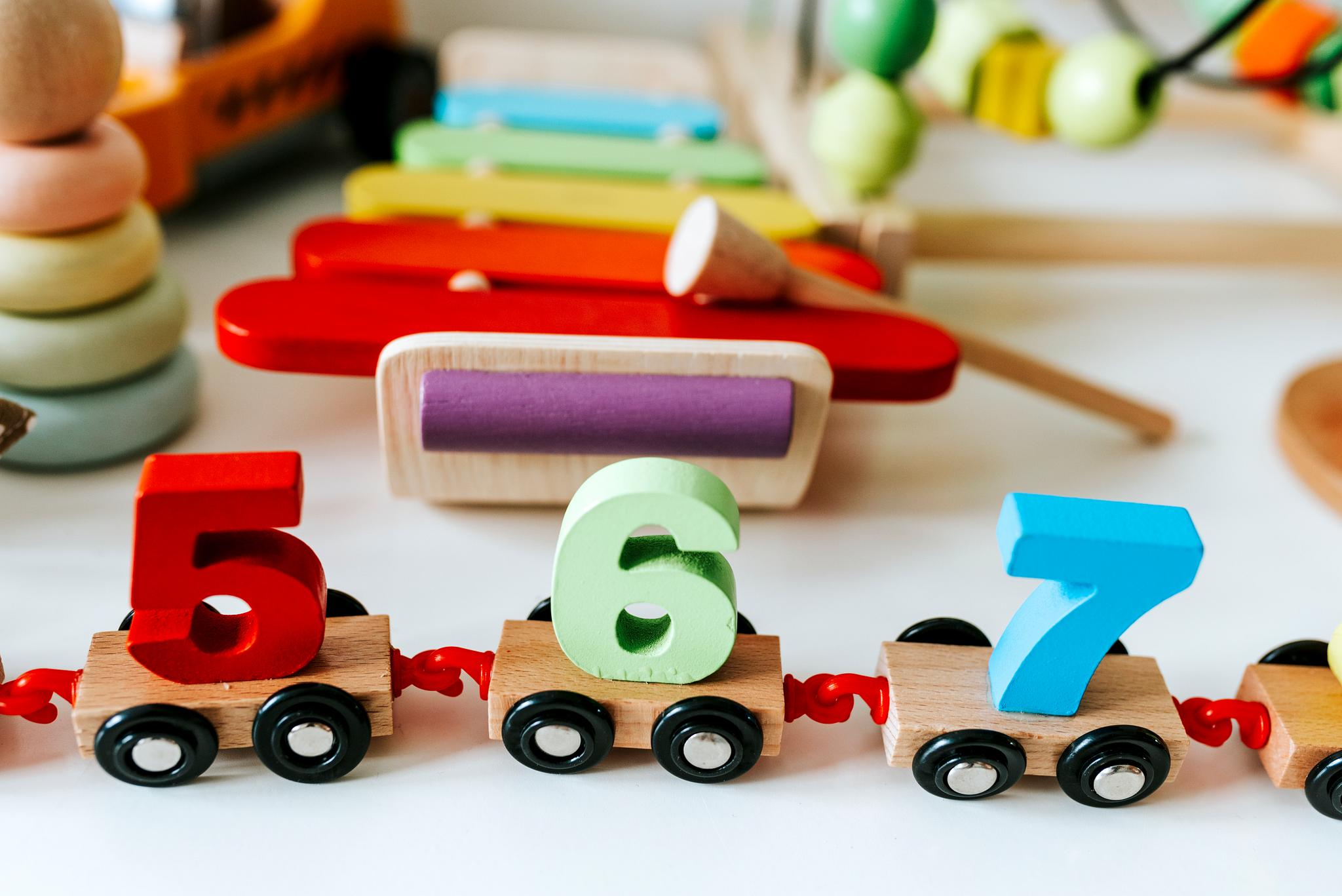 Kids spelling out words with alphabet blocks Royalty free stock photo