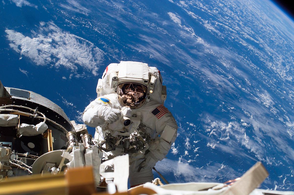 Astronaut Michael A. Lopez-Alegria pauses… | Free public domain photo Astronaut Michael A. Lopez-Alegria pauses near the front of the International Space Station during an expedition on 8th Feb…