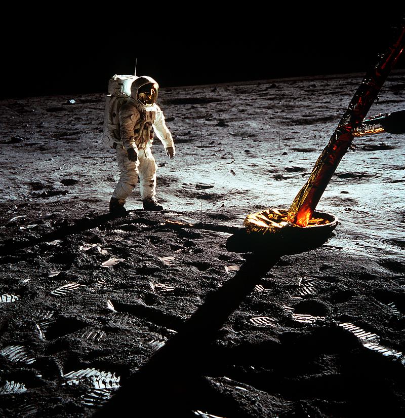 Moon landing photograph Astronaut Edwin E. Aldrin Jr., lunar module pilot, walks on the surface of the moon near a leg of the Lunar Module during the…