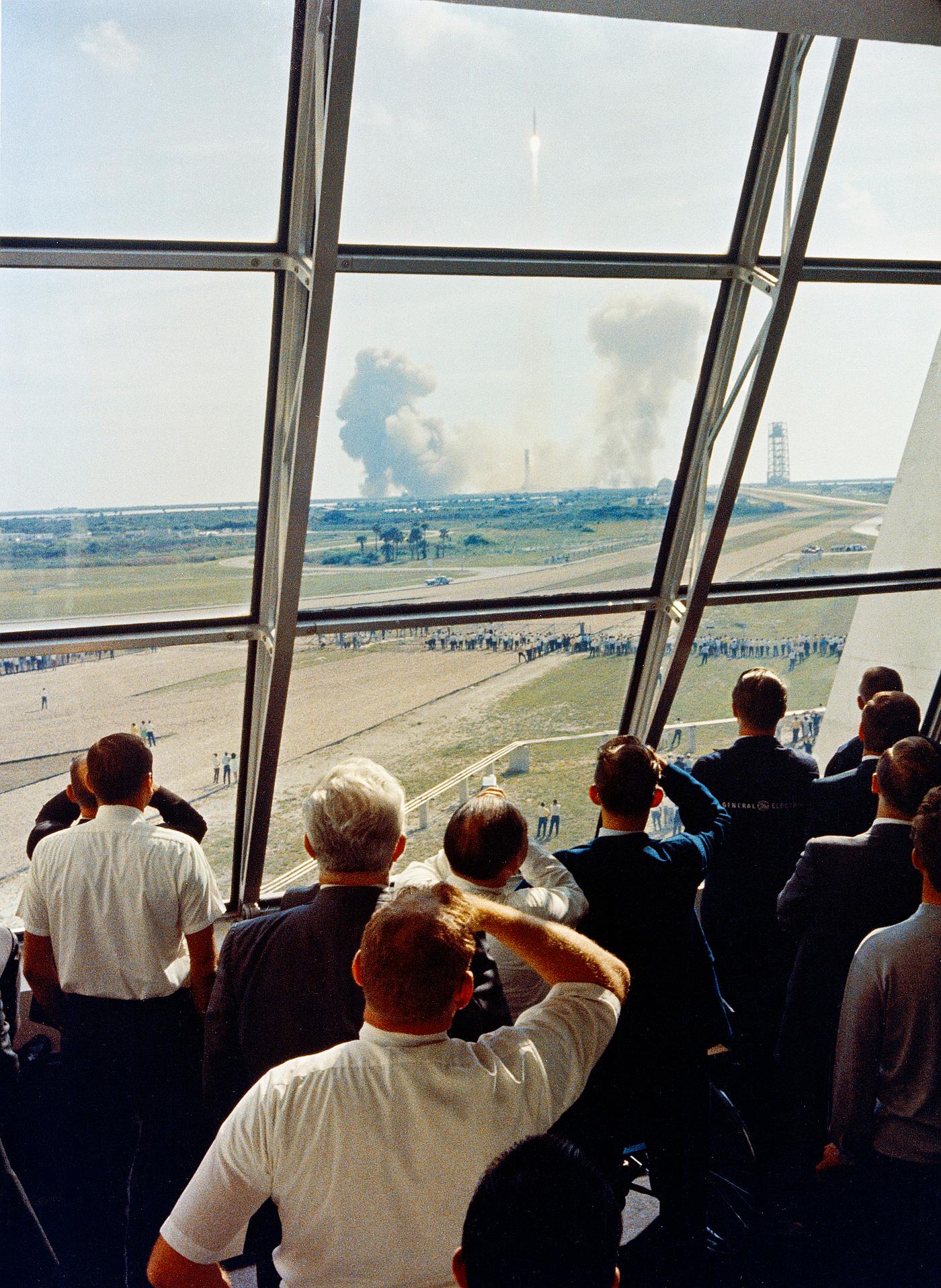 Personnel within the Launch Control Center watch the Apollo 11 liftoff from Launch Complex 39A at the start of the historic... Personnel within the Launch Control Center watch the Apollo 11 liftoff from Launch Complex 39A at the start of the historic...