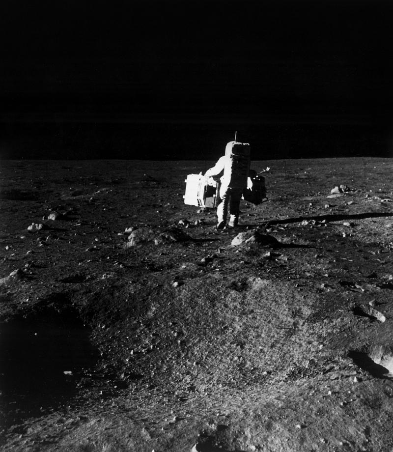 Moon landing photograph Astronaut Edwin E. Aldrin Jr., lunar module pilot, is photographed with scientific equipment. Original from NASA. Digitally…