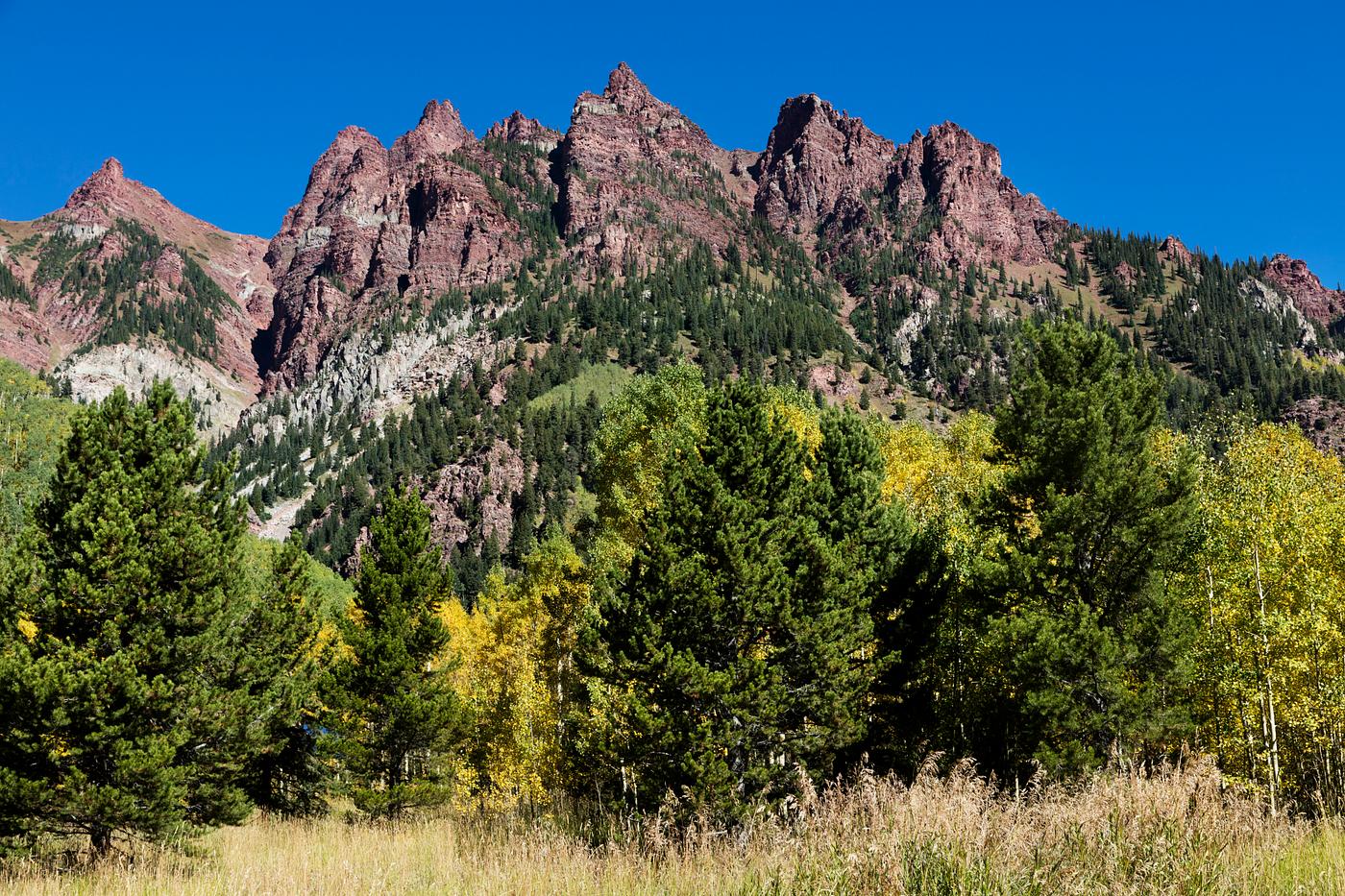 The Maroon Bells, just outside Aspen in Colorado's Rocky Mountains USA - Fall aspens in San Juan County, Colorado USA -... The Maroon Bells, just outside Aspen in Colorado's Rocky Mountains USA - Fall aspens in San Juan County, Colorado USA -...