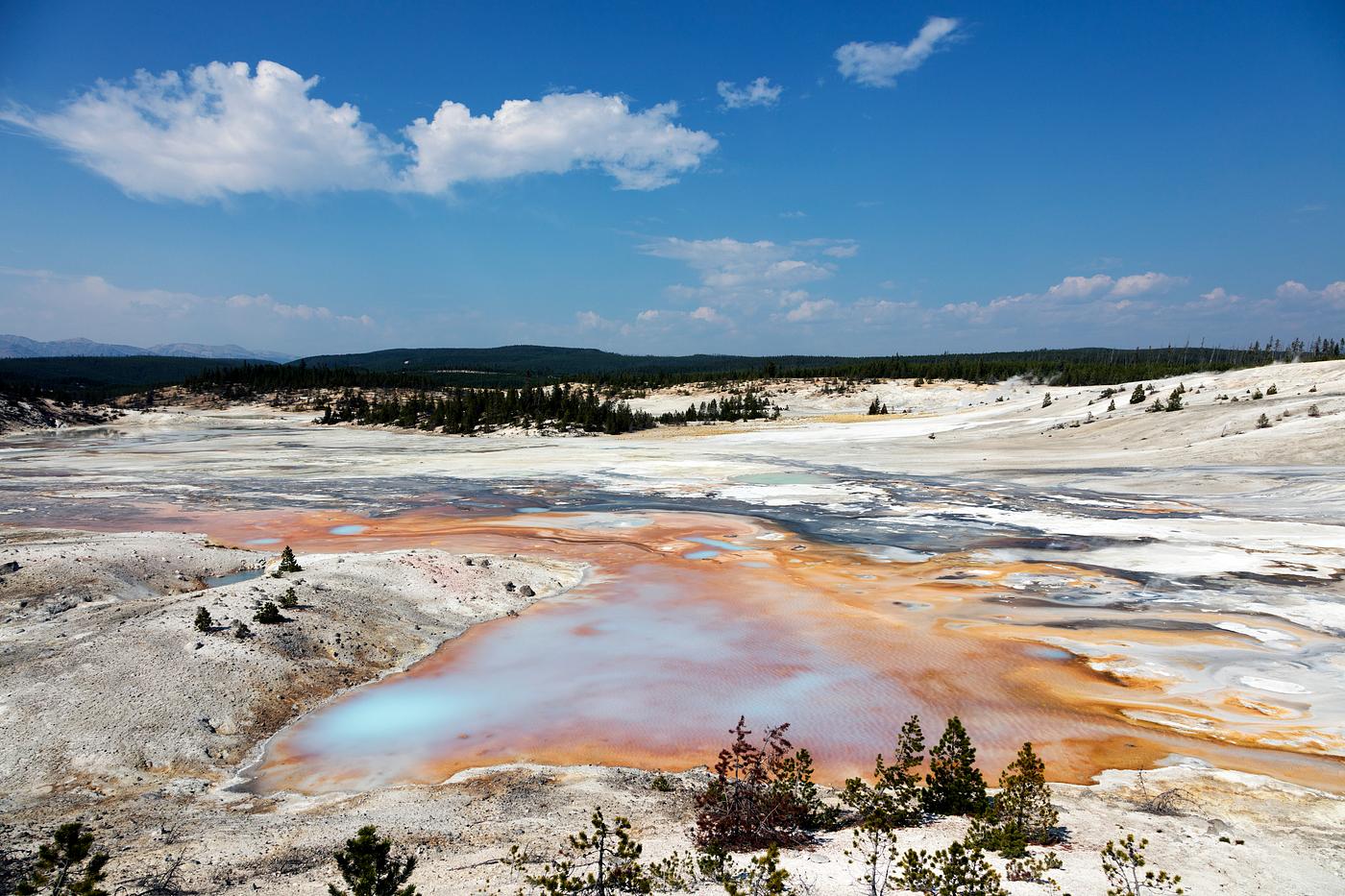 Mudpots and hot springs color the terrain in northwestern Wyoming's Yellowstone National Park. Original image from Carol... Mudpots and hot springs color the terrain in northwestern Wyoming's Yellowstone National Park. Original image from Carol...