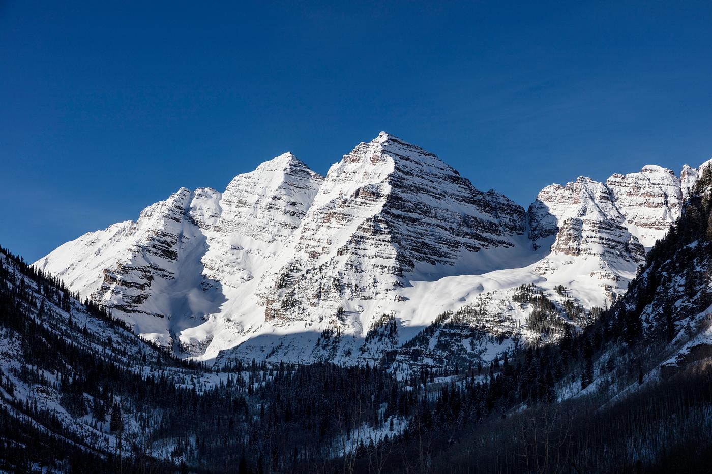 The Maroon Bells, just outside Aspen in Colorado's Rocky Mountains USA - Fall aspens in San Juan County, Colorado USA -... The Maroon Bells, just outside Aspen in Colorado's Rocky Mountains USA - Fall aspens in San Juan County, Colorado USA -...