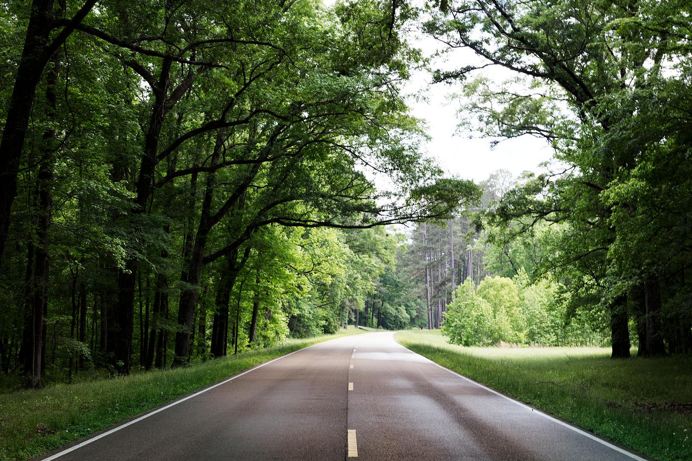 Road through Smugglers' Notch, a narrow mountain pass surrounded by high bluffs in Lamoille County, Vermont. Original... Road through Smugglers' Notch, a narrow mountain pass surrounded by high bluffs in Lamoille County, Vermont. Original...