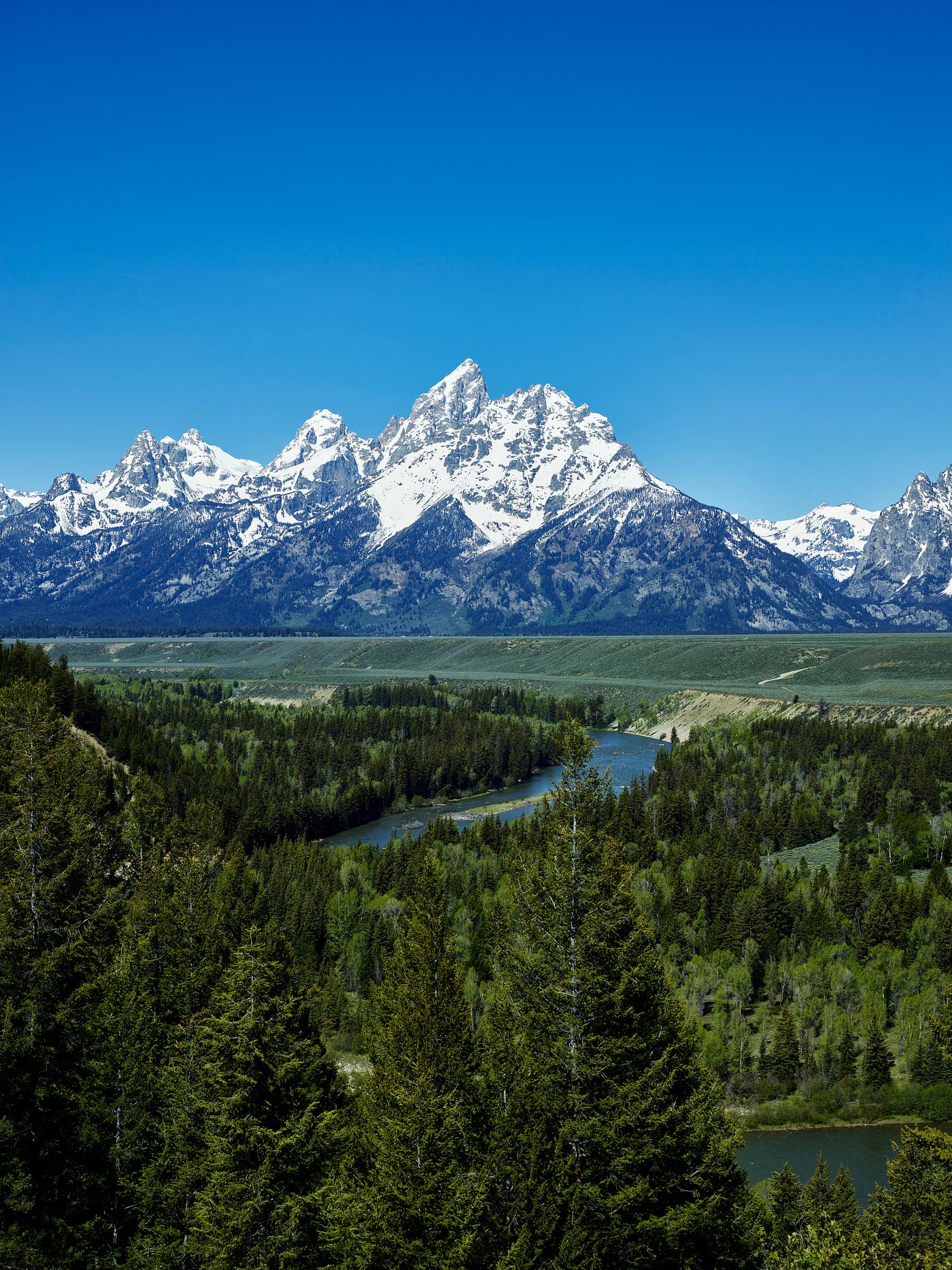 Spectacular peaks in the Teton Range seem to explode from the valley in Grand Teton National Park in northwest Wyoming.... Spectacular peaks in the Teton Range seem to explode from the valley in Grand Teton National Park in northwest Wyoming....