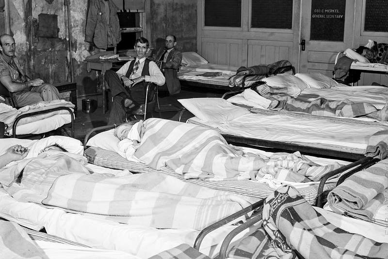 Flophouse of about thirty-seven beds at fifty cents each, constantly crowded with construction workers sleeping in several…