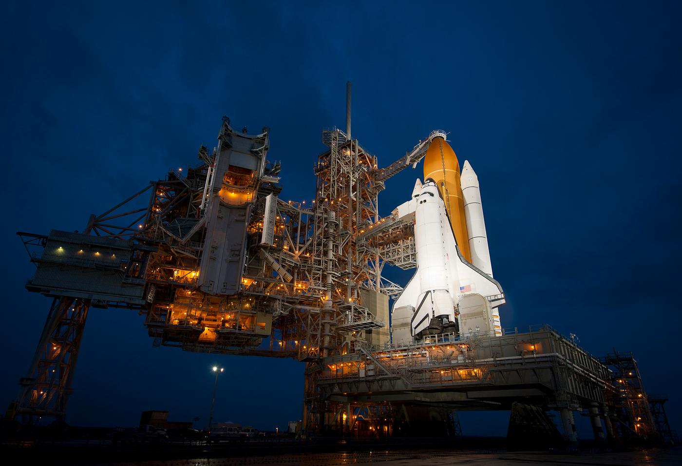 Atlantis is seen shortly after the rotating service structure was rolled back at launch pad 39a at the NASA Kennedy Space... Atlantis is seen shortly after the rotating service structure was rolled back at launch pad 39a at the NASA Kennedy Space...