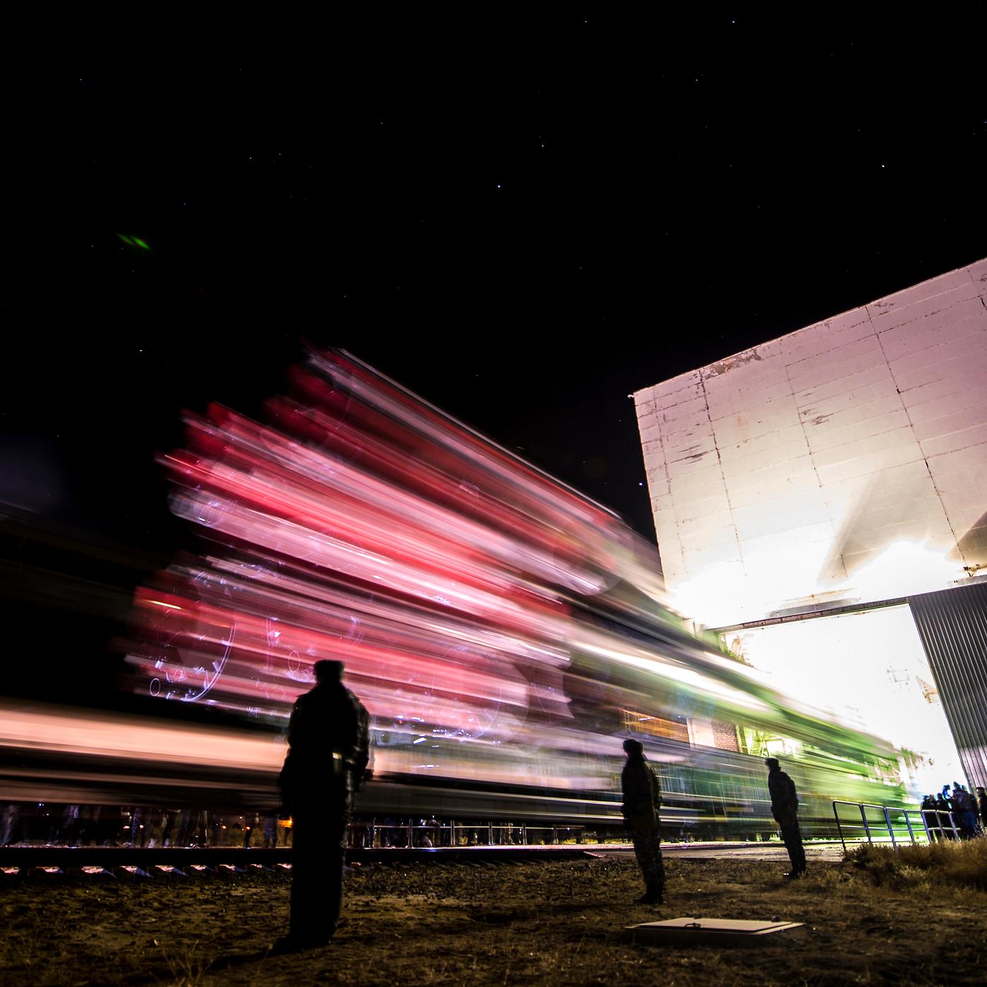 The Soyuz TMA-11M rocket is seen as it is rolled out to the launch pad by train at the Baikonur Cosmodrome in Kazakhstan.... The Soyuz TMA-11M rocket is seen as it is rolled out to the launch pad by train at the Baikonur Cosmodrome in Kazakhstan....