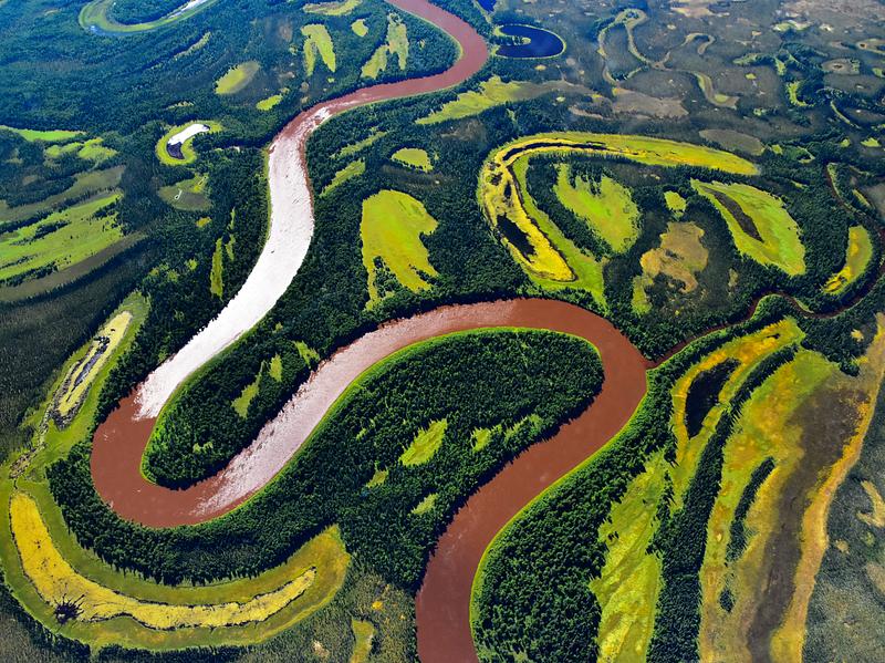 River drone shot NASA scientists are flying over Alaska and Canada, measuring the elevation of rivers and lakes. Original from NASA. Digitally…