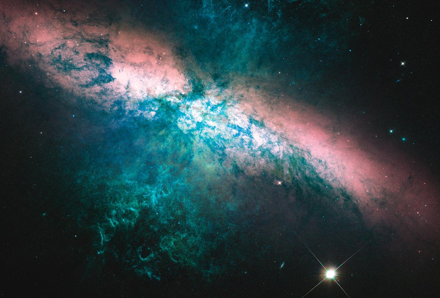 Messier 82 is a starburst galaxy approximately 12 million light-years away in the constellation Ursa Major. Original from... Messier 82 is a starburst galaxy approximately 12 million light-years away in the constellation Ursa Major. Original from...