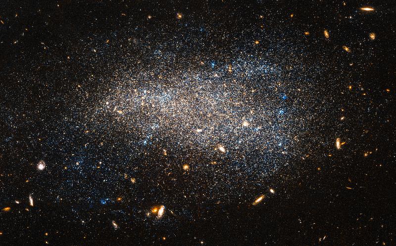 Irregular galaxy Hubble Nets a Subtle Swarm. This Hubble image shows NGC 4789A, a dwarf irregular galaxy in the constellation of Coma…