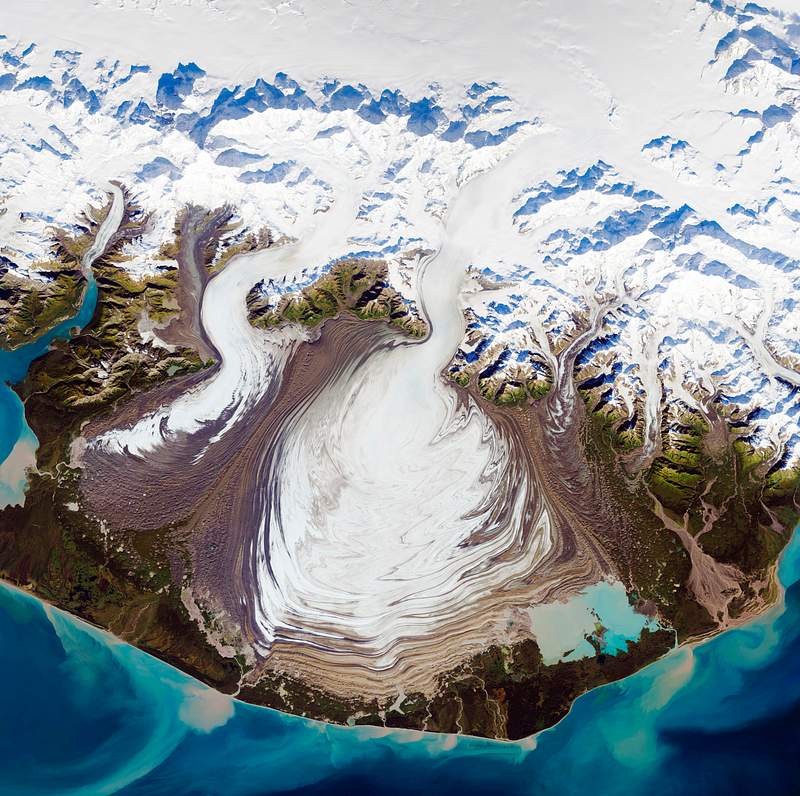 The ice of a piedmont glacier spills from a steep valley onto a relatively flat plain. Malaspina Glacier, Alaska. Original from NASA. Digitally enhanced by rawpixel. The ice of a piedmont glacier spills from a steep valley onto a relatively flat plain. Malaspina Glacier, Alaska. Original…