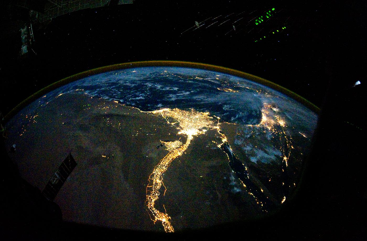 Night time photo featuring the bright lights of Cairo and Alexandria, Egypt on the Mediterranean coast. The Sinai Peninsula... Night time photo featuring the bright lights of Cairo and Alexandria, Egypt on the Mediterranean coast. The Sinai Peninsula...