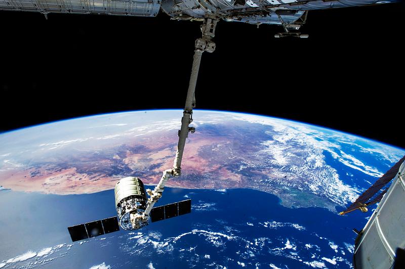 Space station The International Space Station's Canadarm2 prepares to release the Orbital Sciences Corporation's commercial cargo craft.…