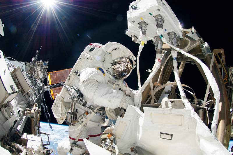 Astronauts working outside the space… | Free public domain photo Astronauts working outside the space station's Quest airlock in Oct 7, 2014. Original from NASA . Digitally enhanced by…