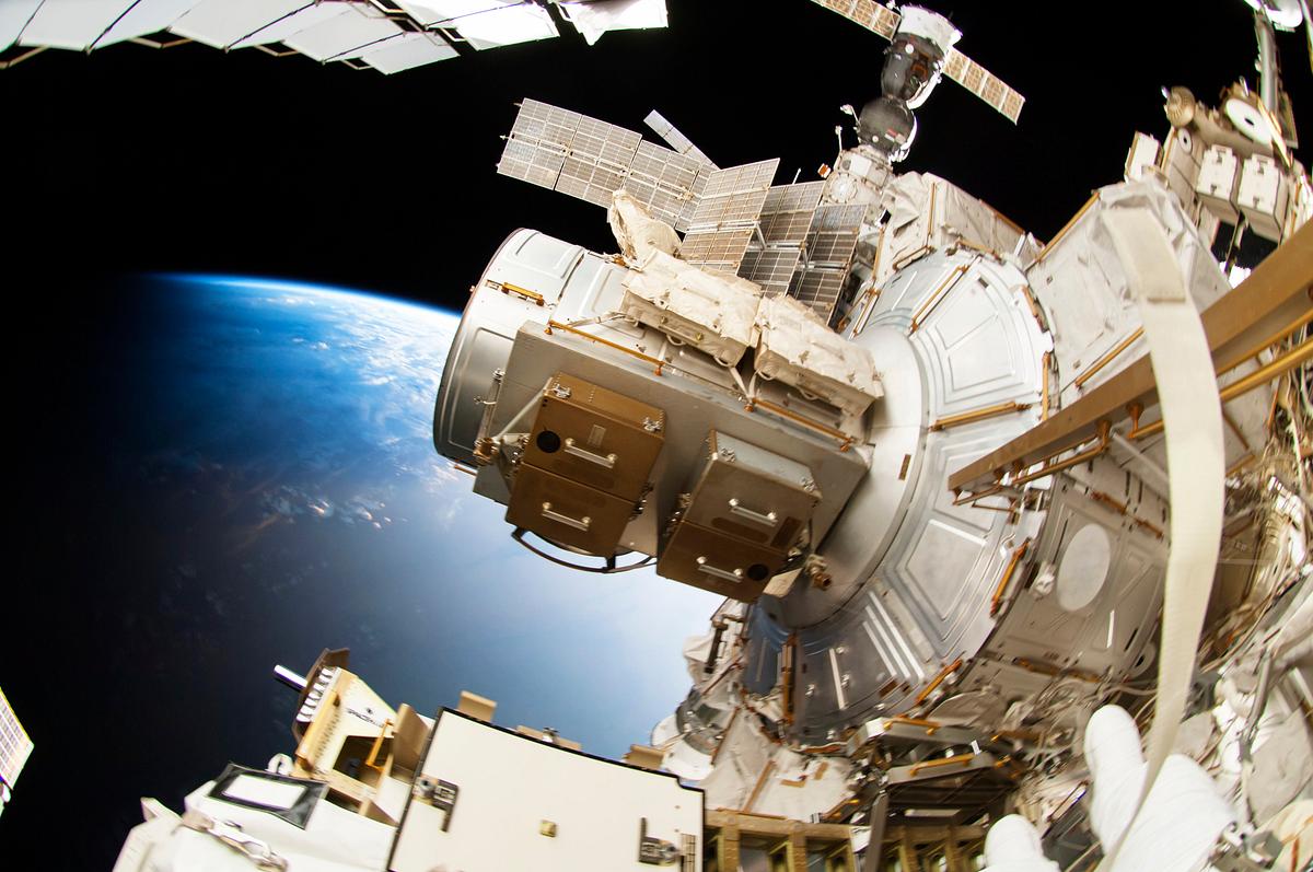 Astronauts working outside the space… | Free public domain photo Astronauts working outside the space station's Quest airlock in Oct 7, 2014. Original from NASA. Digitally enhanced by…