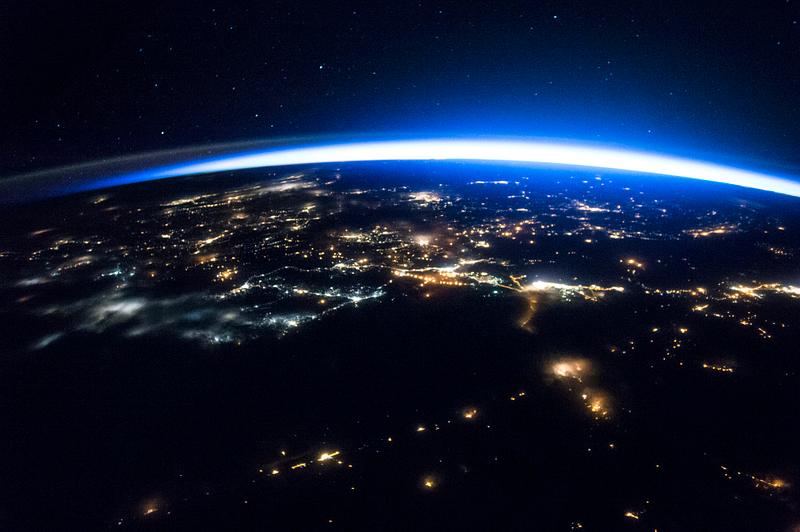Night image of sparkling cities and a sliver of daylight framing the northern hemisphere. Original from NASA. Digitally enhanced by rawpixel. Night image of sparkling cities and a sliver of daylight framing the northern hemisphere. Original from NASA. Digitally…