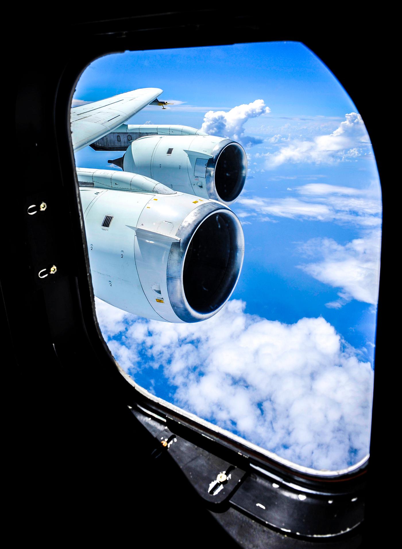 Cloud formations are seen through the window of NASA DC-8 aircraft during a flight over the Gulf of Mexico, Aug. 17, 2010.... Cloud formations are seen through the window of NASA DC-8 aircraft during a flight over the Gulf of Mexico, Aug. 17, 2010....