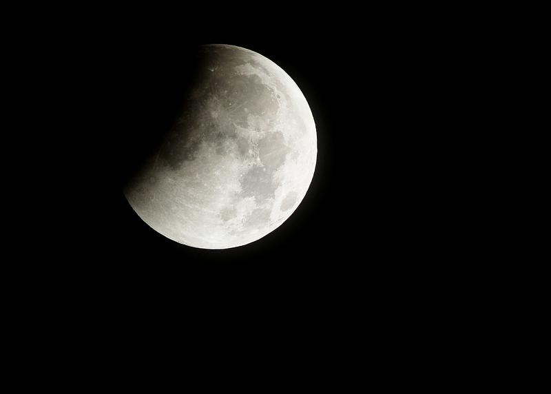 A total lunar eclipse begins as the full moon is shadowed by the Earth on the arrival of the winter solstice, December 21, 2010 in Arlington, VA. Original from NASA. Digitally enhanced by rawpixel. A total lunar eclipse begins as the full moon is shadowed by the Earth on the arrival of the winter solstice, December 21…