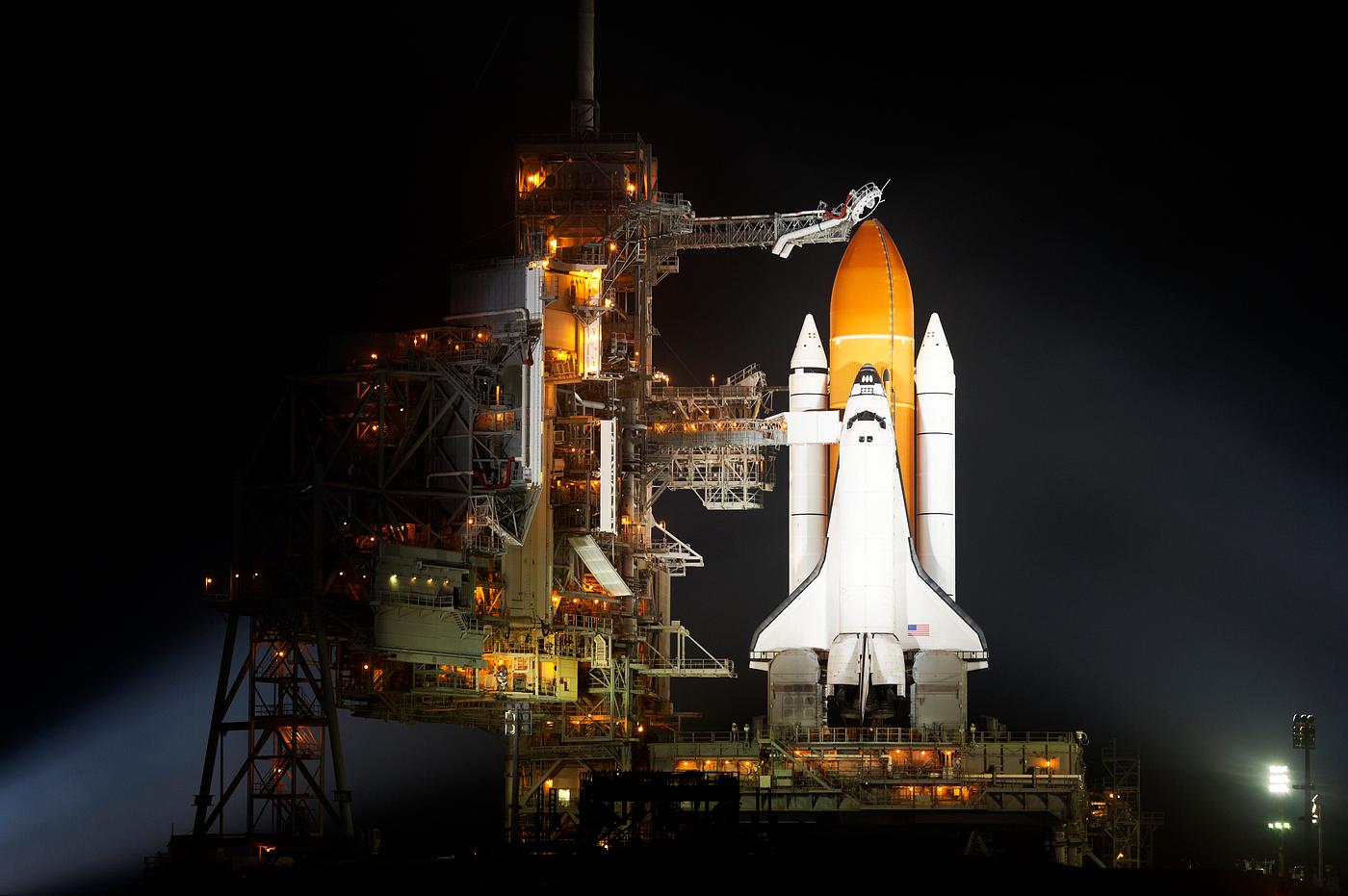 The space shuttle Discovery is seen shortly after the Rotating Service Structure was rolled back at launch pad 39A, at the... The space shuttle Discovery is seen shortly after the Rotating Service Structure was rolled back at launch pad 39A, at the...