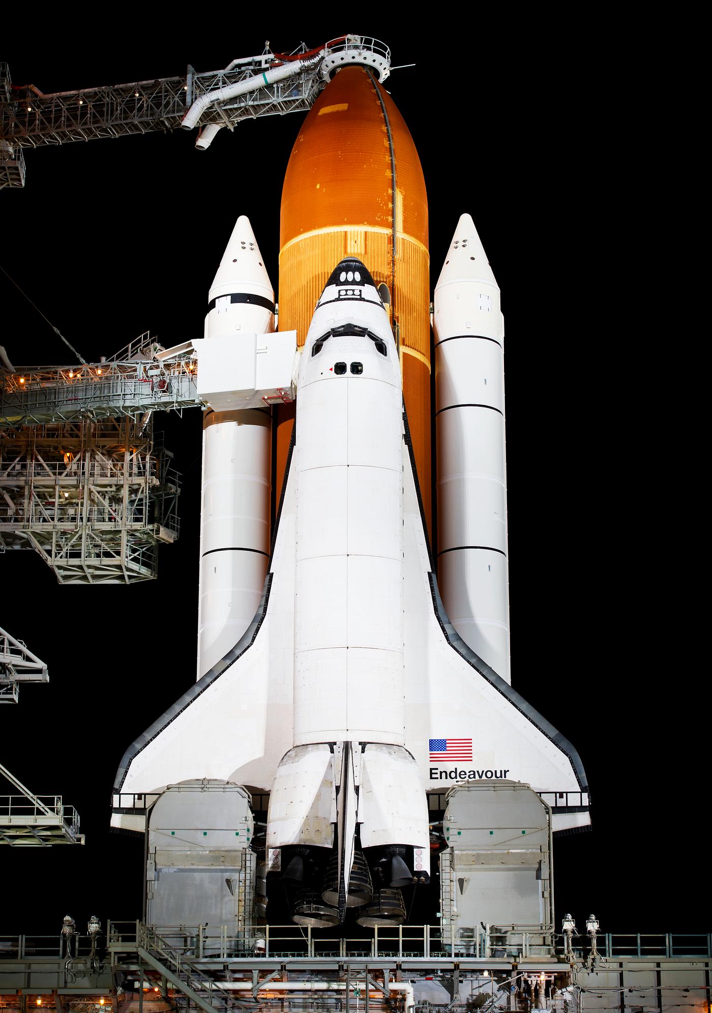 The mobile launcher platform with space shuttle Endeavour on top comes to rest on Launch Pad 39A. Original from NASA .... The mobile launcher platform with space shuttle Endeavour on top comes to rest on Launch Pad 39A. Original from NASA ....