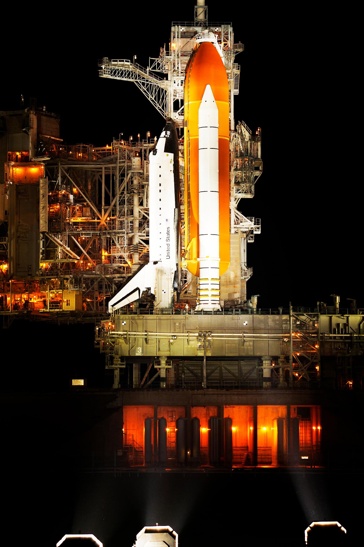 The space shuttle Atlantis is seen shortly after the rotating service structure (RSS) was rolled back at launch pad 39a,... The space shuttle Atlantis is seen shortly after the rotating service structure (RSS) was rolled back at launch pad 39a,...
