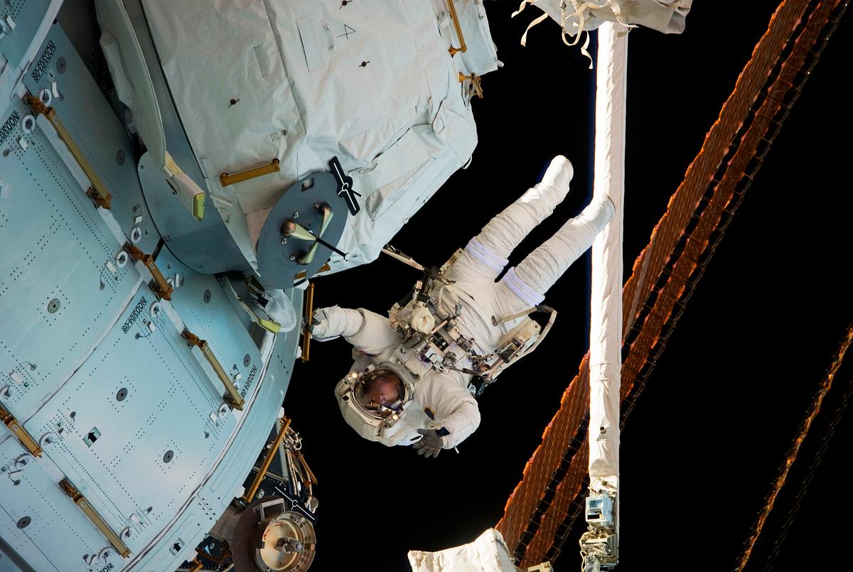 Astronaut Nicholas Patrick | Free public domain photo NASA astronaut Nicholas Patrick during EVA-3 on Expedition 22. Original from NASA. Digitally enhanced by rawpixel.
